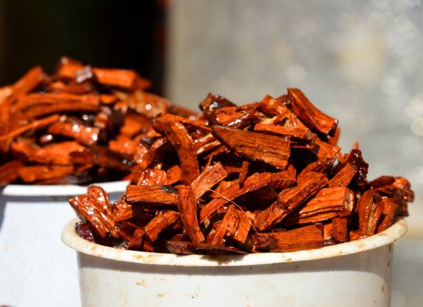 Red sandalwood, Omdurman Market, Khartoum, Sudan Khartoum, Sudan: bits of red sandalwood in buckets for sale - Omdurman Market sandalwood stock pictures, royalty-free photos & images