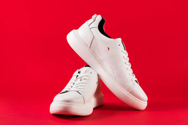 istock Men's shoes. White sneaker on background . 1156895791
