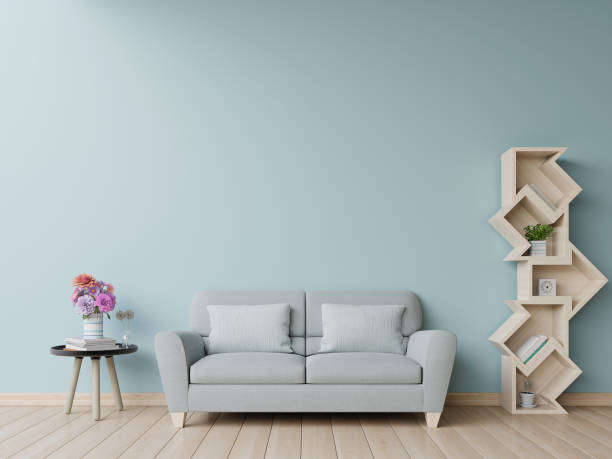 istock Bookshelf in living room have sofa and blue wall 1156895984