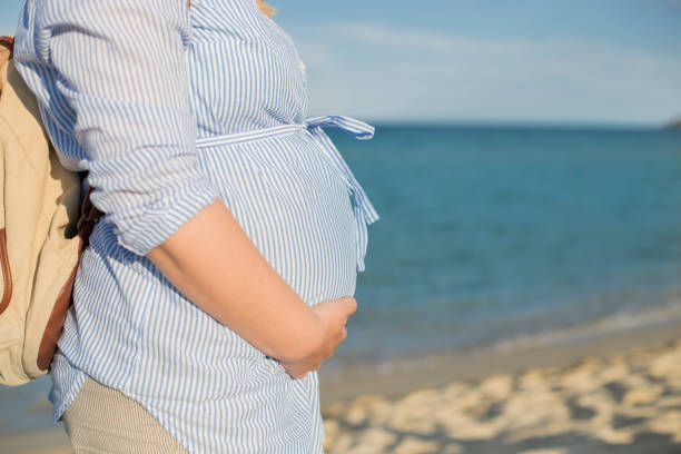 istock Enjoying pregnancy at the sea 1156897176