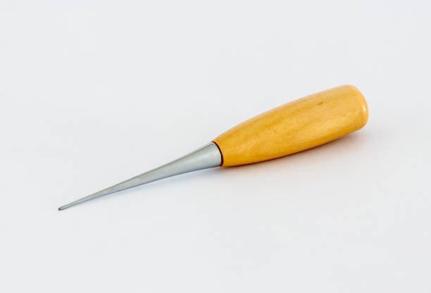 Awl for shoemakers with a wooden handle isolated on a white background