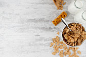 Breakfast Background with Granola Bar and Corn Flakes
