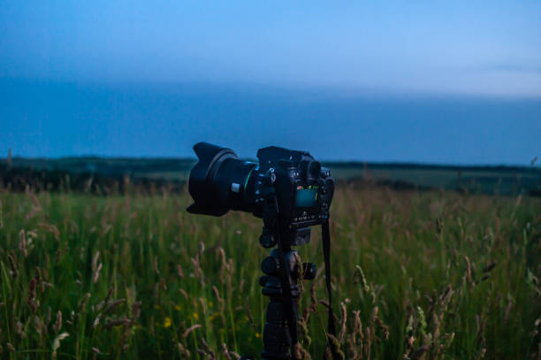 istock SLR camera on the background of the dawn 1156899637