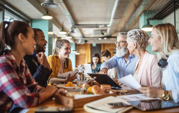 business people meeting at a restaurant, bar - atividades de fins de semana imagens e fotografias de stock