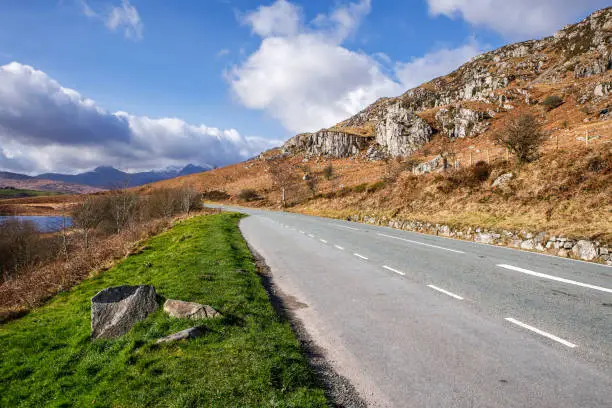 Photo of Beautiful road of  Snowdonia national park.  Snowdonia is a mountainous region in northwestern Wales in the United Kingdom.