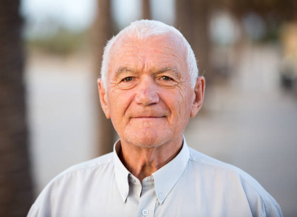 istock Portrait mature man in the park 1156903232
