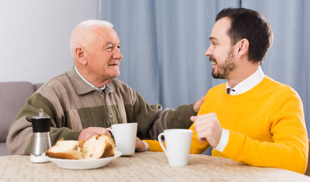 istock Elderly father and son breakfast 1156903418