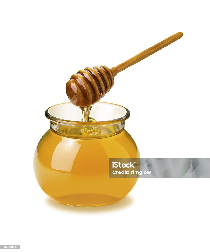 Honey Jar and Dipper Honey Jar and Dipper isolated on white Color Image Stock Photo