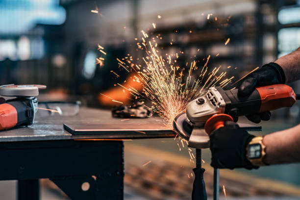 istock Grinding metal part at factory workshop, close-up. 1156909568