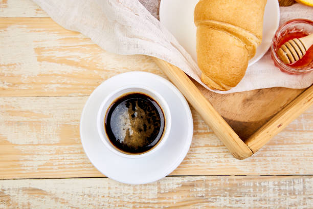 istock Good morning. Continental breakfast on ristic wooden background. 1156916851
