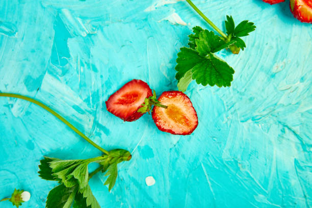 istock Flat lay composition with strawberries on a pink background. 1156916914