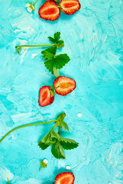 istock Flat lay composition with strawberries on a pink background. 1156916917