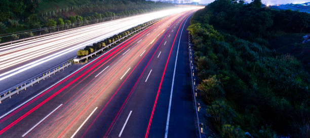 Highway fast traffic at night,  long time exposure Highway fast traffic at night,  long time exposure car street blue night stock pictures, royalty-free photos & images