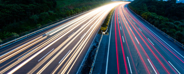 istock Highway fast traffic at night,  long time exposure 1156917597