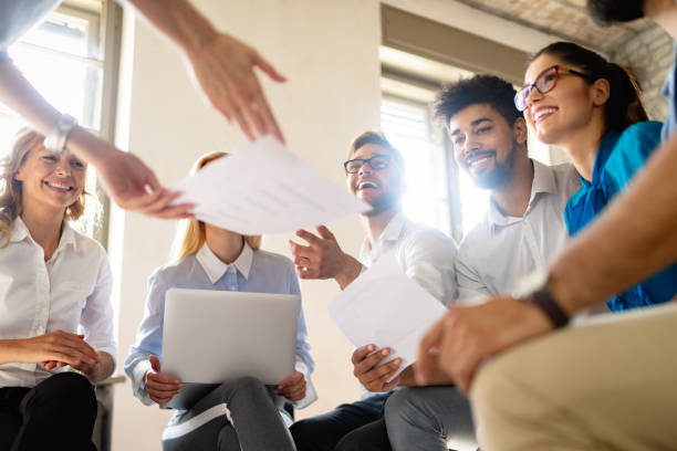 istock Successful business group of people at work in office 1156918355