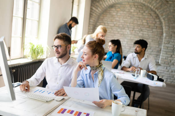 istock Successful business group working at the office. 1156918470