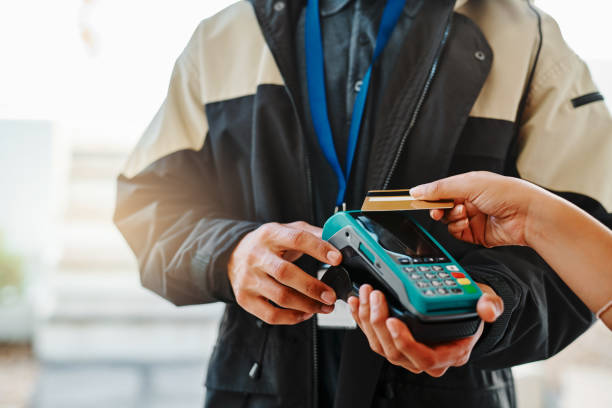 istock It's pretty easy, you just swipe your card 1156918645