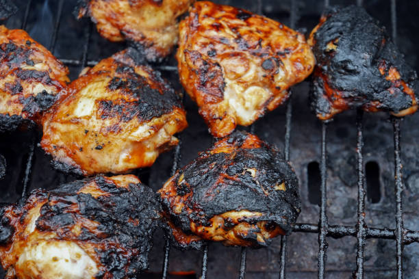 istock Chicken cooking on a BBQ 1156918839
