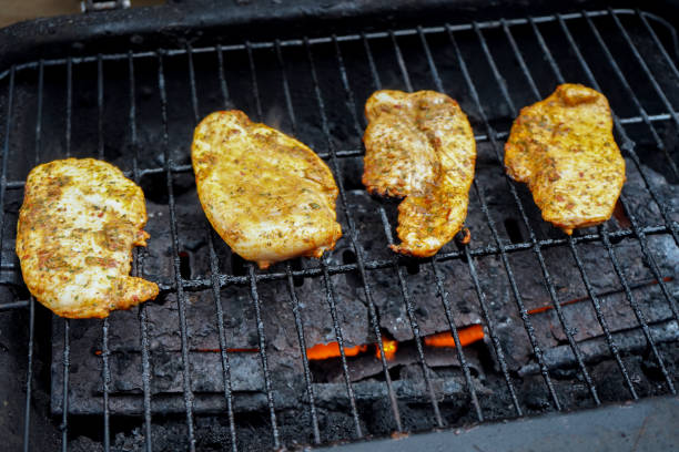 istock Chicken cooking on a BBQ 1156918851