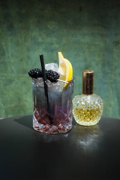 istock Elegant Cocktail Drink in purple blue 1156918974