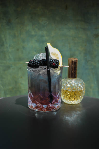 istock Elegant Cocktail Drink in purple blue 1156918984