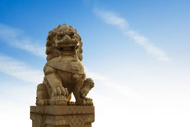 istock Buddhist sculpture. Singha Stone statue in Bangkok, Thailand 1156920154