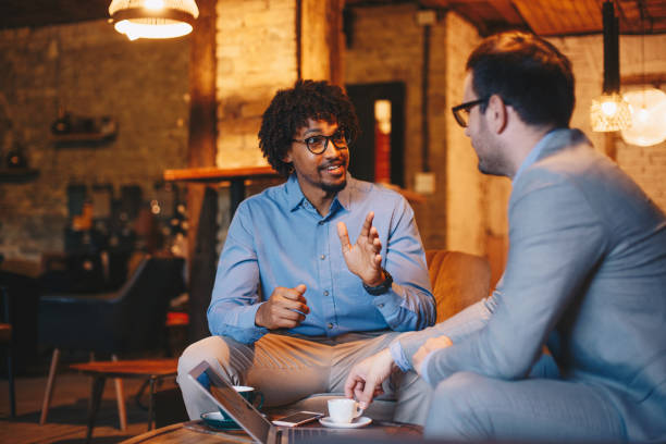 istock Discussing ideas on how to expand their business 1156920384