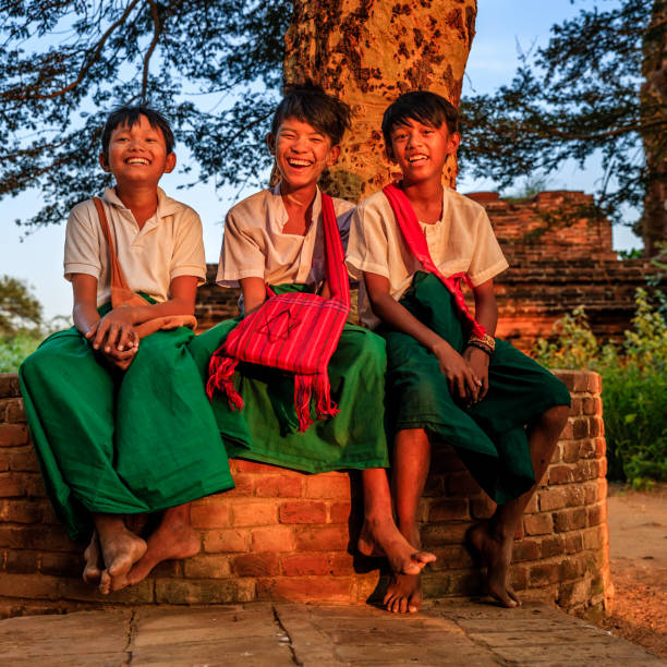 istock Young Burmese schoolboys resting in Bagan, Myanmar 1156925445