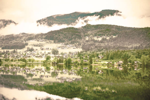 istock Clouds and mist on the Hallstattersee in Austria. 1156926891
