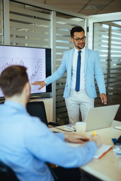 istock Presenting business development on a meeting in the office 1156928652