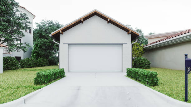 Luxury House Garage With Concrete Driveway The exterior of a modern garage with a concrete driveway at the urban district. driveway stock pictures, royalty-free photos & images