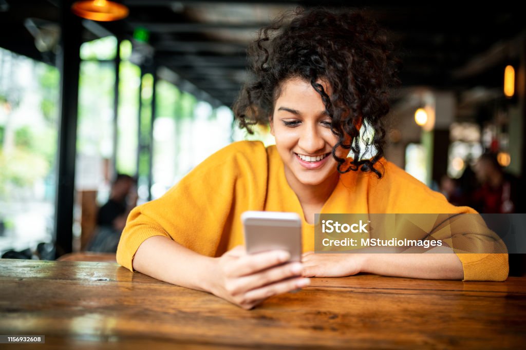 Using Moble Phone Using Mobile Phone Stock Photo - Download Image Now - Mobile App ...