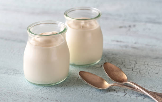 istock Two jars of Greek yogurt 1156932914