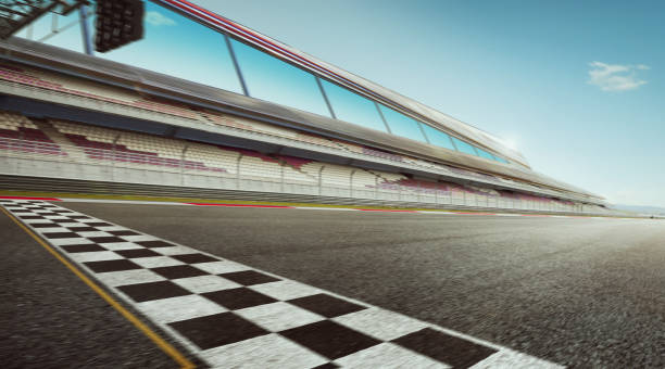 international race track Wide angle view empty asphalt international race track with start and finish line , motion blur effect apply . sports track stock pictures, royalty-free photos & images