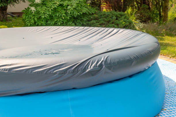 istock A round, blue, garden pool for children. 1156935145