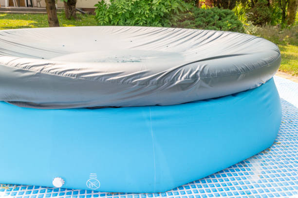 istock A round, blue, garden pool for children. 1156935161