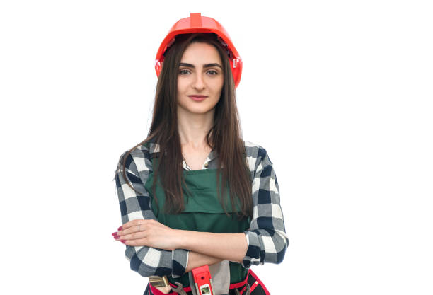 istock Woman in tool belt and coverall isolated on white 1156935501