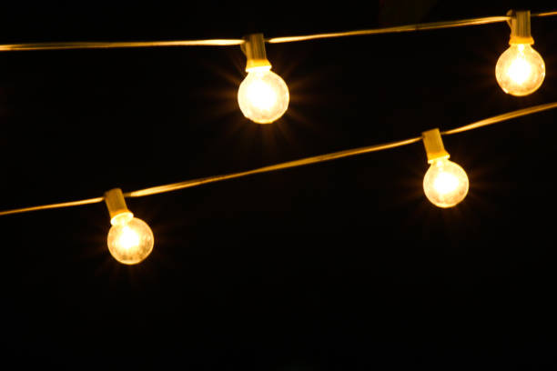 istock The light bulb in the dark background 1156935632