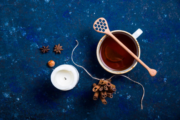 istock Hot autumn drink on a dark blue background 1156936934