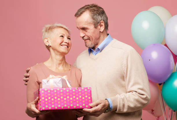 istock Mature couple celebrating anniversary 1156937180
