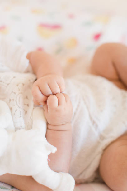 istock Baby Girl Hands 1156937302