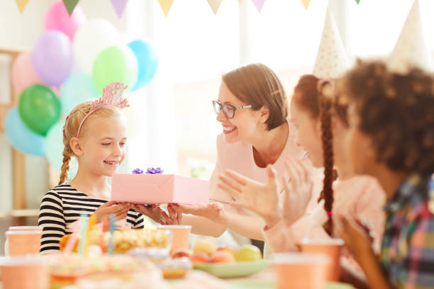 istock Birthday  Gift from Loving Mom 1156938920