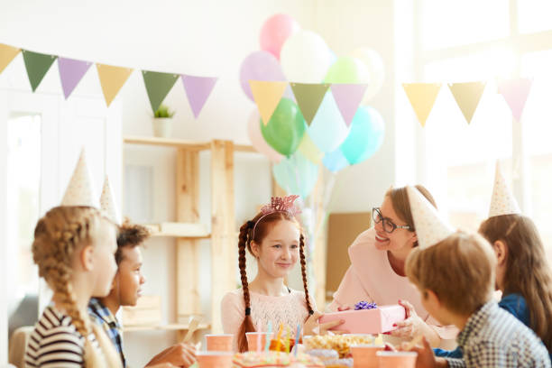 istock Red Haired Girl at Birthday Party 1156938921
