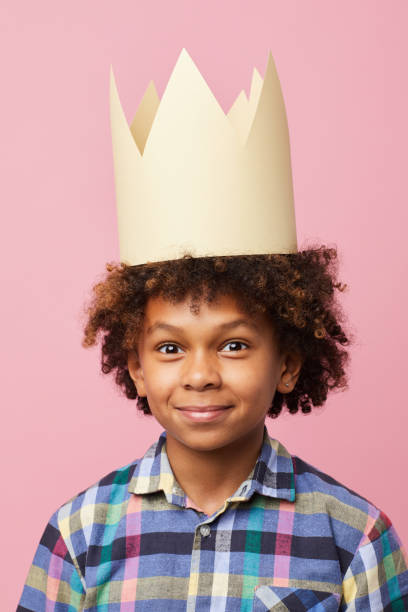 istock African Boy Wearing Crown 1156939045