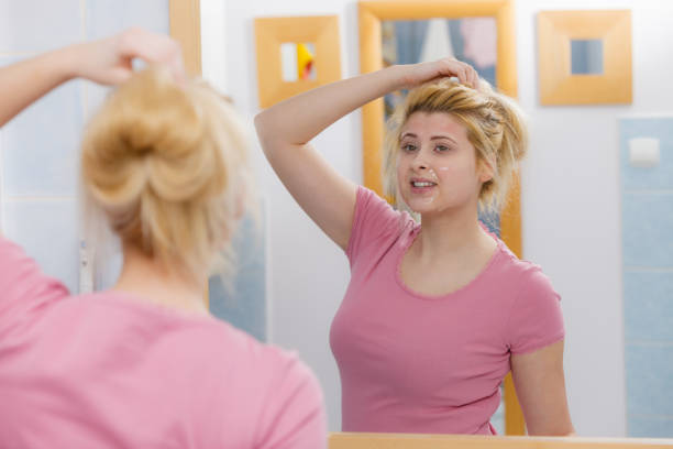 istock Young woman having gel mask on face 1156940049