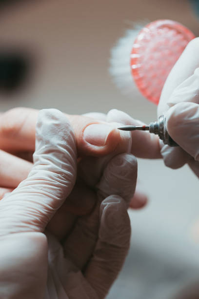 istock Process of manicure beauty routine in spa. 1156940715