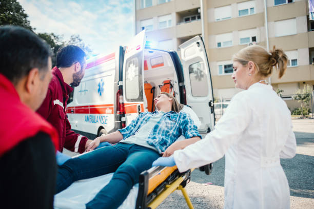 istock Paramedic team pushing stretcher 1156941152