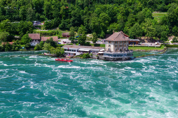 istock Rhein river waterfall aerial view sunny sommer day 1156942104