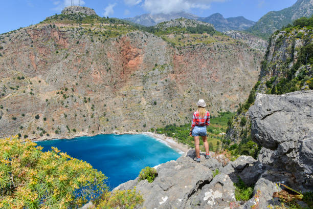 istock Butterfly valley. Hiking woman 1156943424