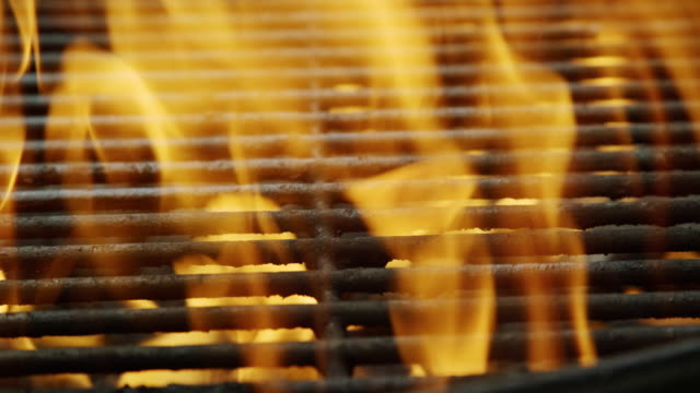Flames Dance in an Outdoor Barbecue Grill